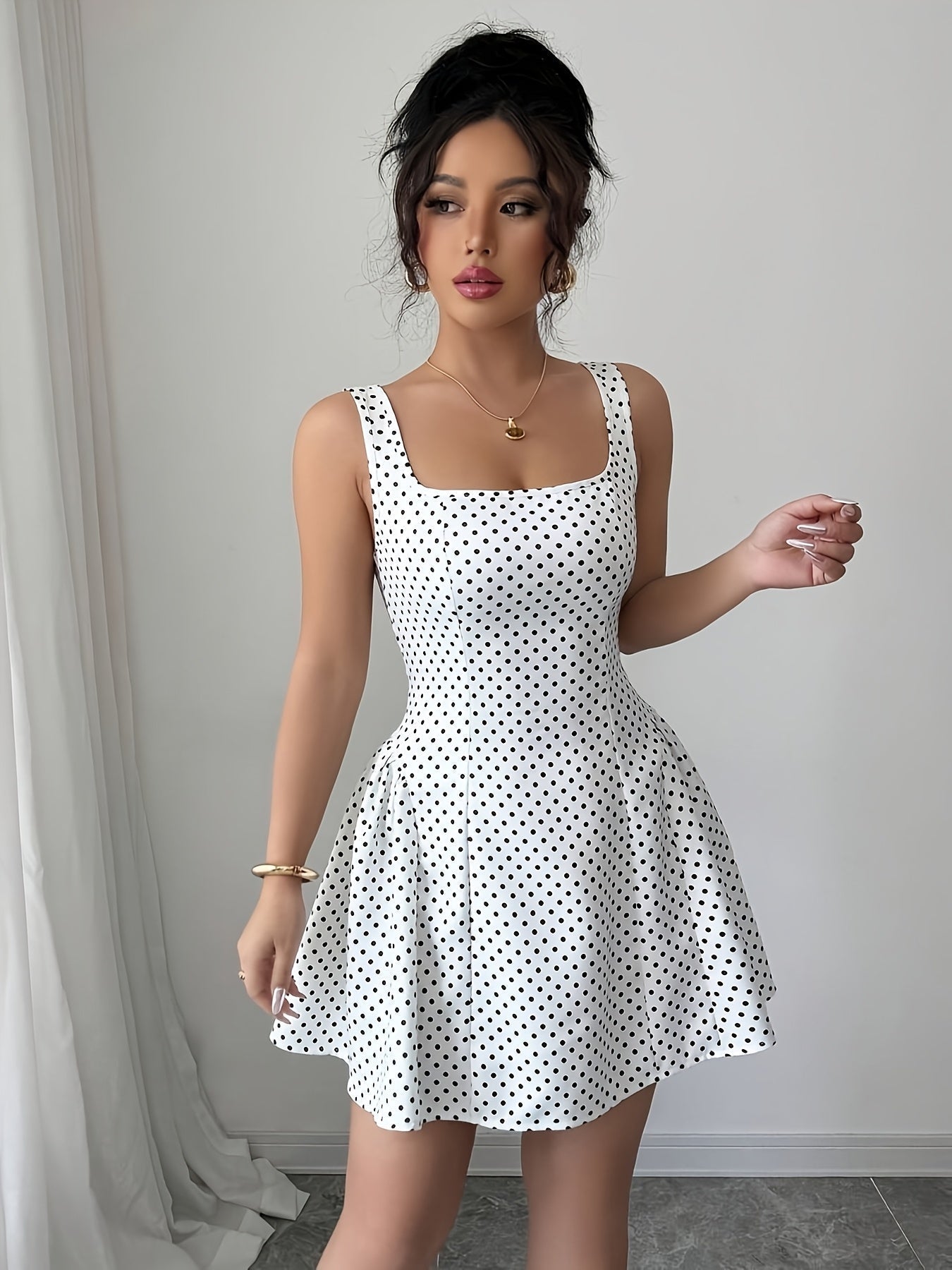 Elegant Short Dress With Polka Dots And A Square Neckline.