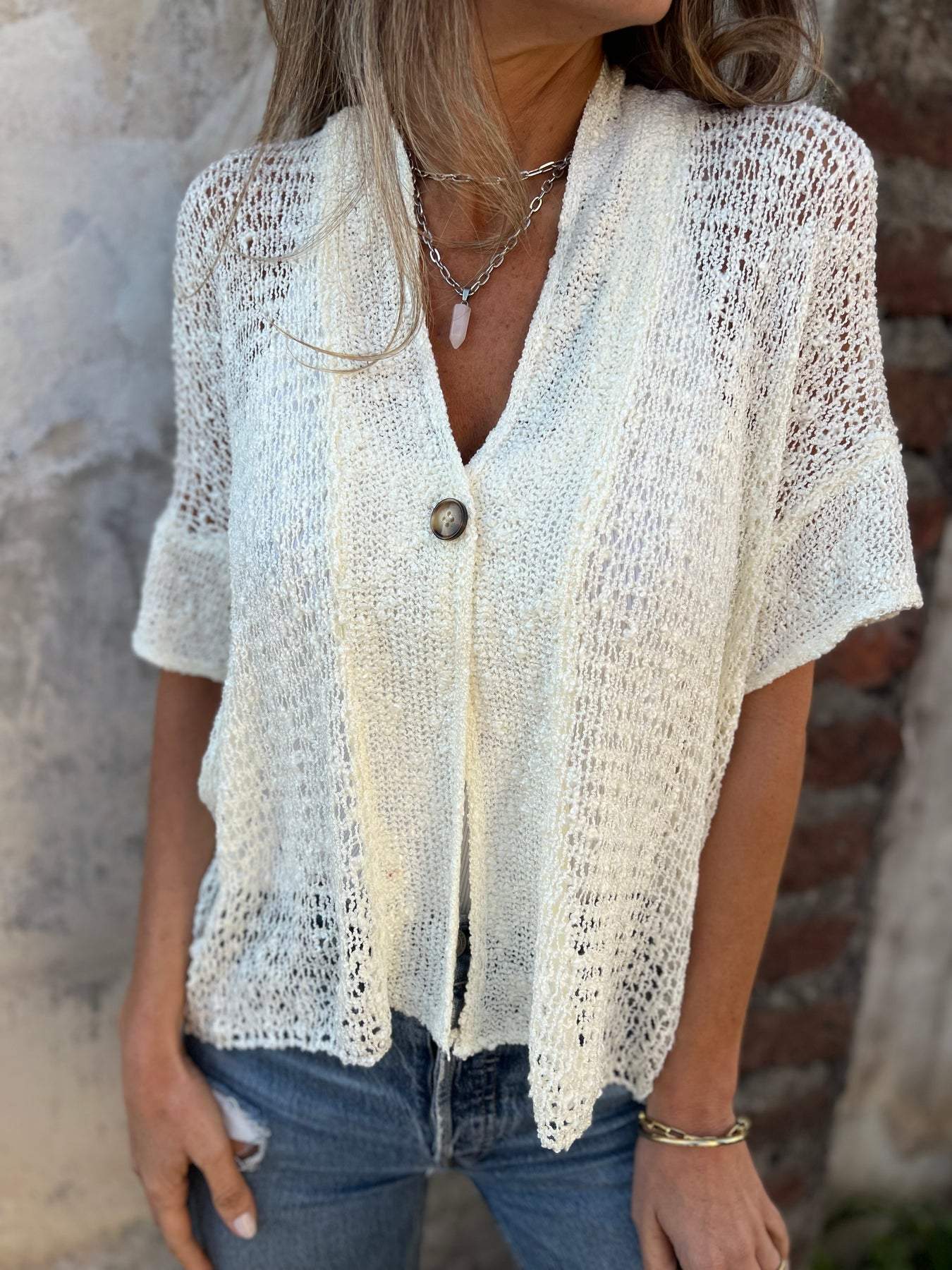 Tindra V Neck Hollow Out Knit Top